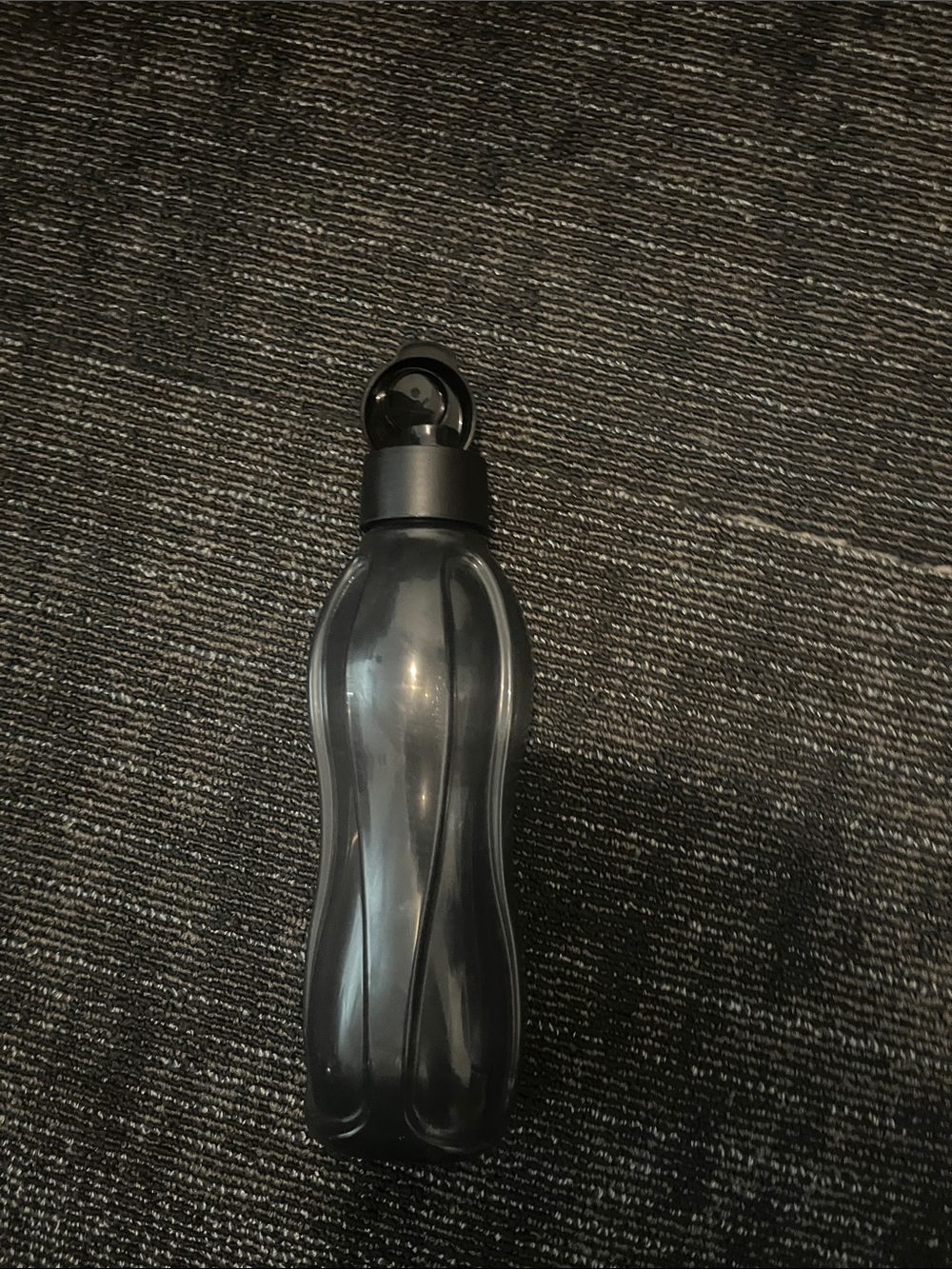 Tupperware - plastic black reusable water bottle